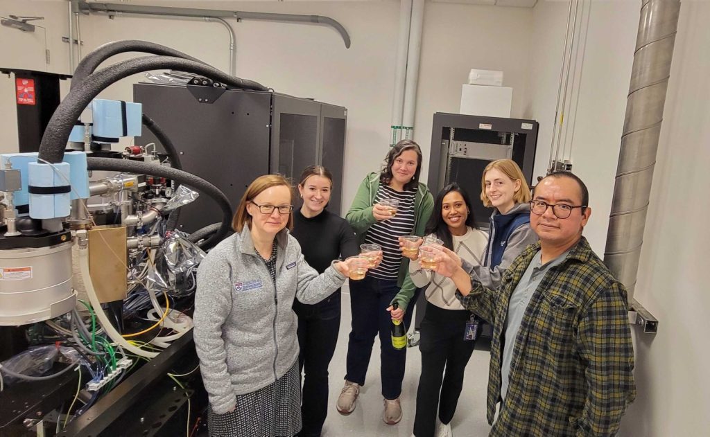 Glacious team celebrates the arrival of new microscope